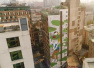 “亚洲最高墙绘”亮相杨浦大学路：46米高墙上勾勒城市景观