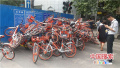 郑州近百辆共享单车被弃街头　堆积如山如同垃圾